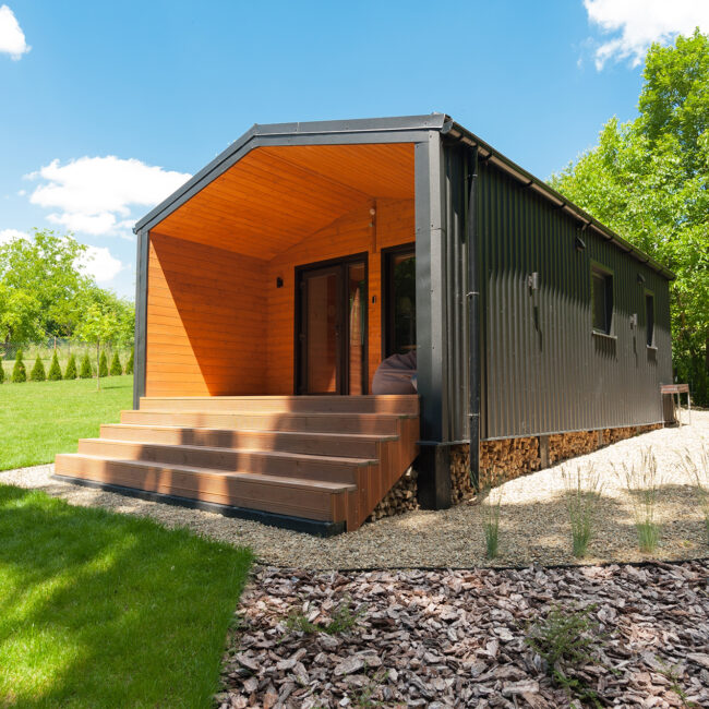 exterior of a suburban compact modular cabin for family vacations